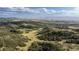 Stunning landscape view featuring rolling hills and lush greenery, great nature scenery at 9758 Red Oakes Dr, Highlands Ranch, CO 80126
