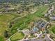 Aerial view of golf course and surrounding neighborhood at 8864 S Quemoy Ct, Aurora, CO 80016