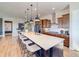 Beautiful, well-equipped kitchen with large center island, ample counter space, and modern appliances at 8864 S Quemoy Ct, Aurora, CO 80016