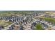 Panoramic aerial shot showcases a residential community nestled in a scenic landscape at 1168 Elbridge Dr, Elizabeth, CO 80107
