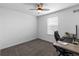 Home office featuring natural light, with a minimalist desk for a productive workspace at 1168 Elbridge Dr, Elizabeth, CO 80107