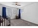 Bedroom/Bedroom with a crib and blue accents with a nice window to let in the light at 1168 Elbridge Dr, Elizabeth, CO 80107