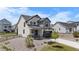 Beautifully designed two-story home with a covered front porch and modern color scheme at 1168 Elbridge Dr, Elizabeth, CO 80107