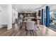 Open concept kitchen with granite countertops, stainless steel appliances and adjacent dining area at 1168 Elbridge Dr, Elizabeth, CO 80107