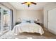 Bright bedroom with ceiling fan and private balcony at 2861 W 119Th Ave # 202, Westminster, CO 80234