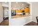 Open kitchen view featuring granite countertops and modern appliances at 2861 W 119Th Ave # 202, Westminster, CO 80234