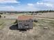 Two-story house with a deck, RV parking, and large grassy lot at 40900 Red Fox Cir, Elizabeth, CO 80107
