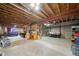 Unfinished basement with exposed beams and concrete floor offers potential for customization at 40900 Red Fox Cir, Elizabeth, CO 80107