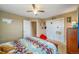 Bedroom with a double bed, windows, closet, and a dresser on a neutral carpeted floor at 40900 Red Fox Cir, Elizabeth, CO 80107