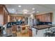 Well-equipped kitchen featuring stainless steel appliances, granite countertops, and wooden cabinets at 40900 Red Fox Cir, Elizabeth, CO 80107