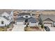 Elegant two-story home with a three-car garage, landscaped front yard, and charming curb appeal at 7077 Copper Sky Cir, Castle Pines, CO 80108