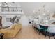 Open-concept living space with kitchen, living, and dining areas at 7077 Copper Sky Cir, Castle Pines, CO 80108