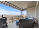 Inviting outdoor patio with comfortable seating, a grill, and scenic views at 7077 Copper Sky Cir, Castle Pines, CO 80108