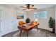 Functional home office with a stylish desk, natural light, and a comfortable chair, perfect for remote work at 4810 W 8Th Ave, Denver, CO 80204