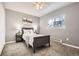 Relaxing bedroom with neutral colors, a window for natural light, and a cozy, welcoming atmosphere at 14602 E 2Nd Ave # 303C, Aurora, CO 80011