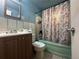 Cozy bathroom with a shower-tub combo, tile floors and functional fixtures at 260 Sheridan Blvd, Denver, CO 80226