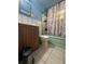 Cozy bathroom with a shower-tub combo, tile floors and functional fixtures at 260 Sheridan Blvd, Denver, CO 80226
