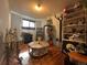 Charming bedroom with eclectic decor and wood floors at 260 Sheridan Blvd, Denver, CO 80226