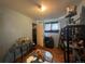 A cozy bedroom with a neutral color scheme and wood floors at 260 Sheridan Blvd, Denver, CO 80226