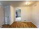 Dining room with hardwood floors, a bright window and an open feel, leading to the kitchen at 260 Sheridan Blvd, Denver, CO 80226
