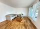 Inviting living room with hardwood floors, neutral-toned seating, and bright natural light at 260 Sheridan Blvd, Denver, CO 80226