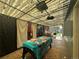 An enclosed patio featuring a dining table and decor at 260 Sheridan Blvd, Denver, CO 80226