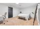Bedroom features a desk, bed with bench, and carpet at 3103 W Bellewood Dr, Englewood, CO 80110