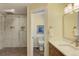 Bright bathroom features a large walk-in shower with tile surround at 20101 Spring Gulch Rd, Morrison, CO 80465