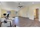 Spacious bedroom featuring hardwood floors, vaulted ceiling and many windows at 20101 Spring Gulch Rd, Morrison, CO 80465