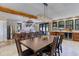 Open concept dining area with a hanging pendant light and access to the kitchen at 20101 Spring Gulch Rd, Morrison, CO 80465
