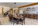 Spacious open concept living room with stairs to the second floor, dining area, and modern kitchen at 20101 Spring Gulch Rd, Morrison, CO 80465