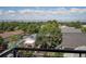 Scenic balcony view overlooking mature trees and mountain peaks in the distance at 277 N Broadway # 403, Denver, CO 80203