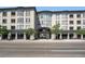 Charming multi-story building with an archway entrance and street-level shops at 277 N Broadway # 403, Denver, CO 80203