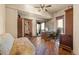Office space with wooden floors, large desk, and natural light and walk out balcony at 142 Outpost Ln, Evergreen, CO 80439