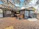 Backyard with a patio, grill, and small playhouse at 7345 E Hinsdale Pl, Centennial, CO 80112