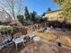 Backyard with outdoor seating area and decorative iron furniture at 7345 E Hinsdale Pl, Centennial, CO 80112