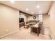 Relaxing living room with a comfortable couch, TV, and wood beam accents at 7388 S Lafayette W Cir, Centennial, CO 80122