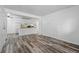 Spacious living room with luxury vinyl floors and neutral paint, ready for personalization at 5995 W Hampden Ave # 3I, Denver, CO 80227