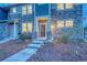 Charming front entrance with beautiful stonework, manicured landscaping, and covered entry at 24806 E Calhoun Pl # A, Aurora, CO 80016