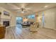 Inviting living room featuring a fireplace and a sliding door to the outside at 24806 E Calhoun Pl # A, Aurora, CO 80016