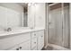 Bathroom with shower and white tiled walls at 6860 Merseyside Ln, Castle Pines, CO 80108