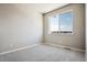 Bright bedroom with neutral walls and carpeted floors at 6860 Merseyside Ln, Castle Pines, CO 80108