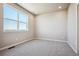 Bright bedroom with neutral walls and carpeted floors at 6860 Merseyside Ln, Castle Pines, CO 80108