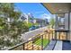 Balcony view of the tree-lined street with modern townhouses at 1238 N Tennyson St, Denver, CO 80204