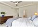 A cozy main bedroom featuring a comfortable bed and an ensuite bathroom at 4478 Riviera Ct, Aurora, CO 80019