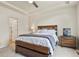 A cozy main bedroom featuring a comfortable bed and soft lighting at 4478 Riviera Ct, Aurora, CO 80019