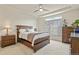 Main bedroom featuring a modern bed frame and a ceiling fan at 4478 Riviera Ct, Aurora, CO 80019