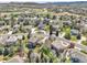 View of neighborhood showcasing lush landscaping and well maintained exteriors at 3266 Coyote Hills Way, Castle Rock, CO 80109