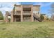 Multi-level decks adorn the rear of this home, offering ample space for outdoor living and entertaining at 3266 Coyote Hills Way, Castle Rock, CO 80109