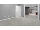 Spacious bedroom featuring a walk-in closet and views to an adjacent space at 3266 Coyote Hills Way, Castle Rock, CO 80109